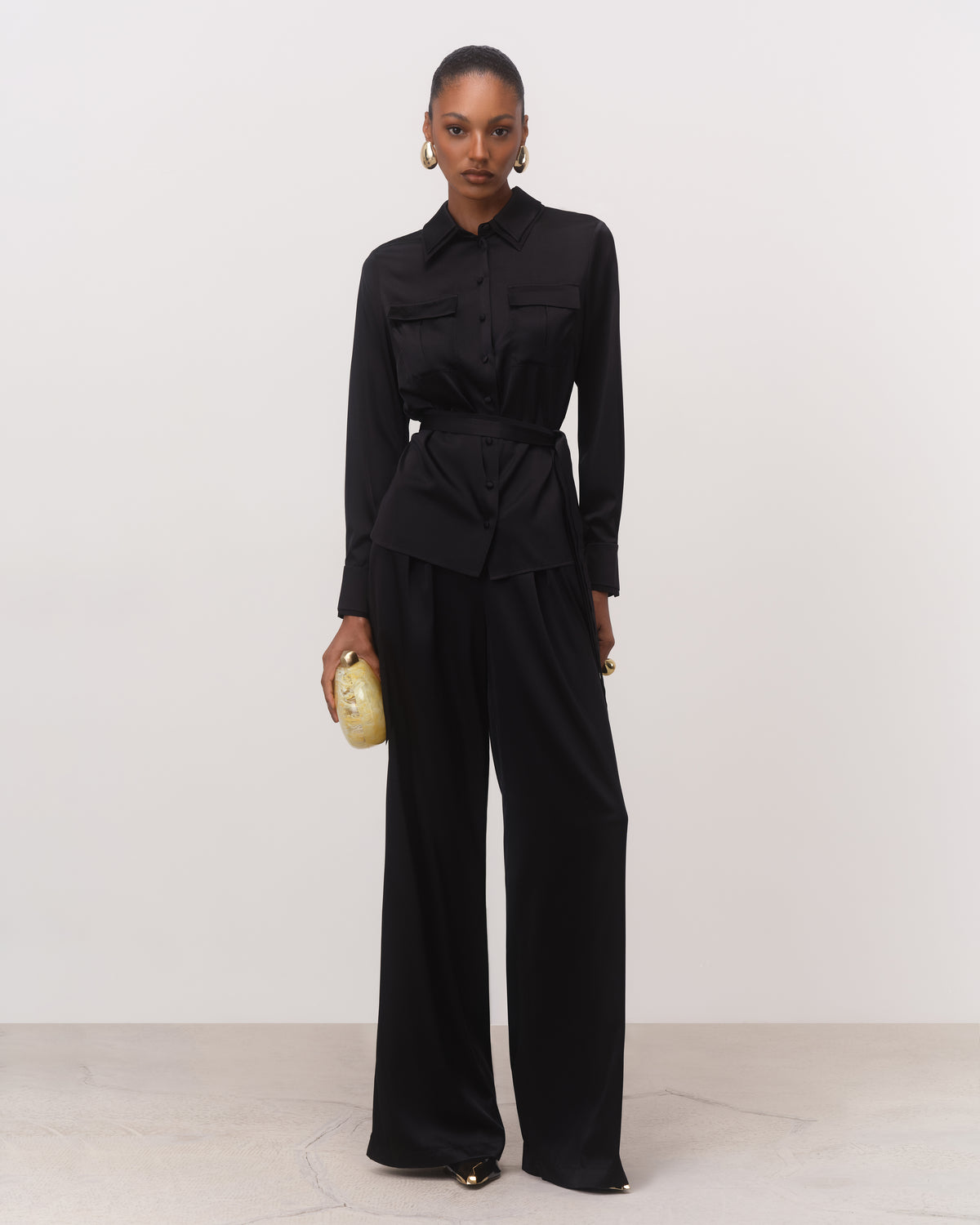 Anitas Muse Dubai black silk belted shirt and wide-leg silk trousers set for women, front view