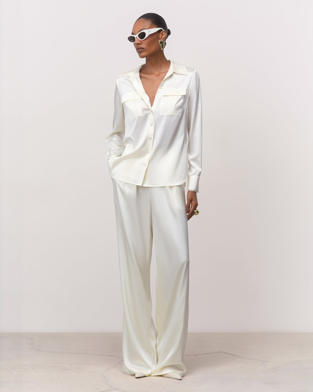 Luxury white silk button-down shirt for women, full-length front view