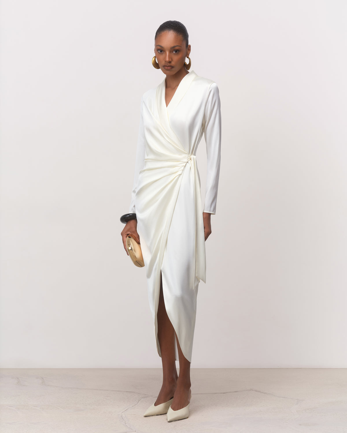 Women's white silk midi dress with asymmetrical front slit, full-length front view