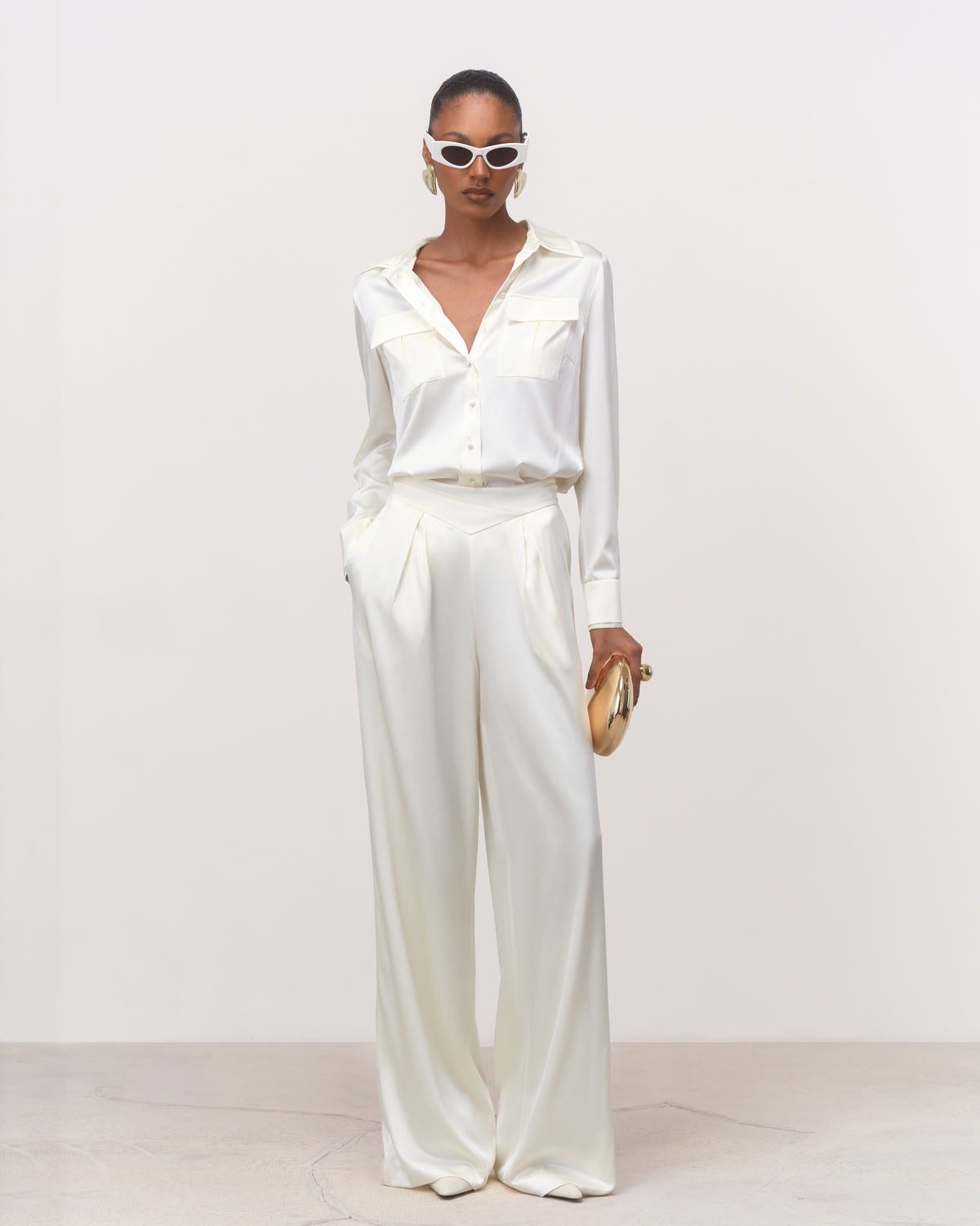 Anitas Muse Dubai pearl white silk co-ord set for women: belted shirt and wide-leg trousers, front view