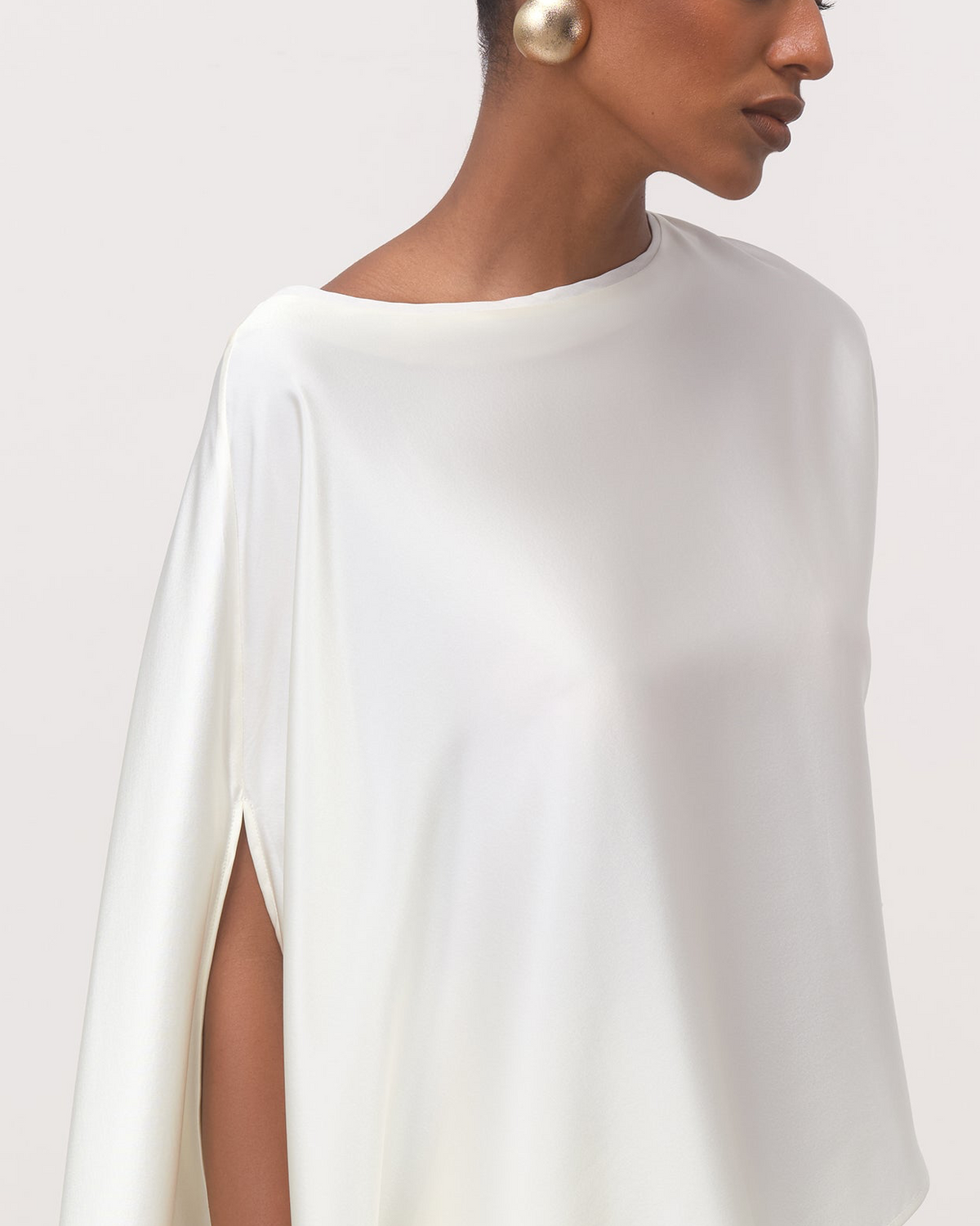 The Zaha Asymmetric Silk Top in Ivory